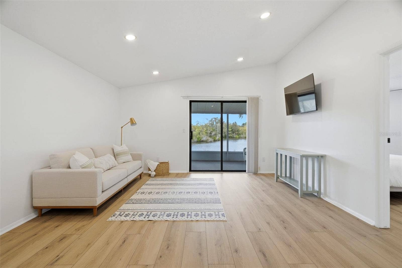 770 ARTHURS COURT, Tarpon Springs, FL 34689 Living Room area with Sliders to the Lanai