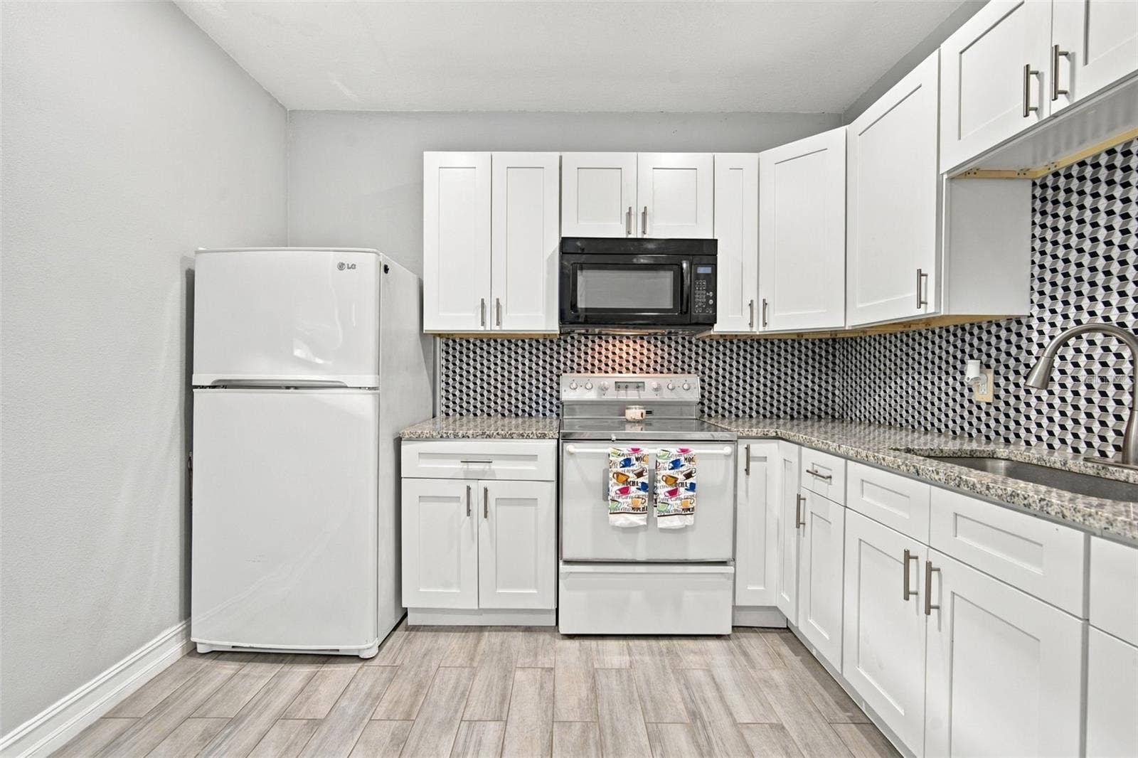 1411 E 24TH AVENUE, Tampa, FL 33605 1411 E 24TH AVENUE, Tampa, FL 33605