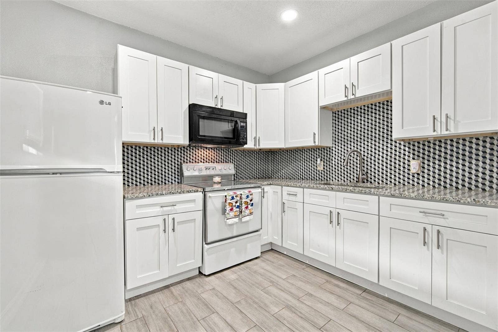 1411 E 24TH AVENUE, Tampa, FL 33605 1411 E 24TH AVENUE, Tampa, FL 33605