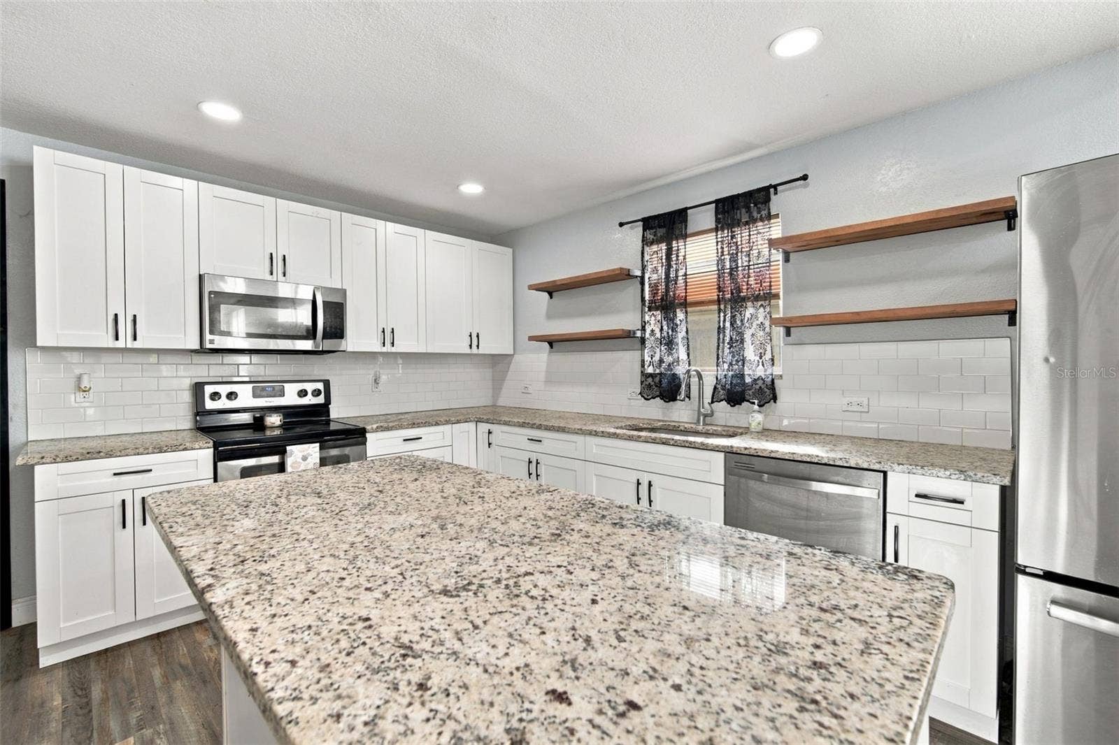 1411 E 24TH AVENUE, Tampa, FL 33605 1411 E 24TH AVENUE, Tampa, FL 33605