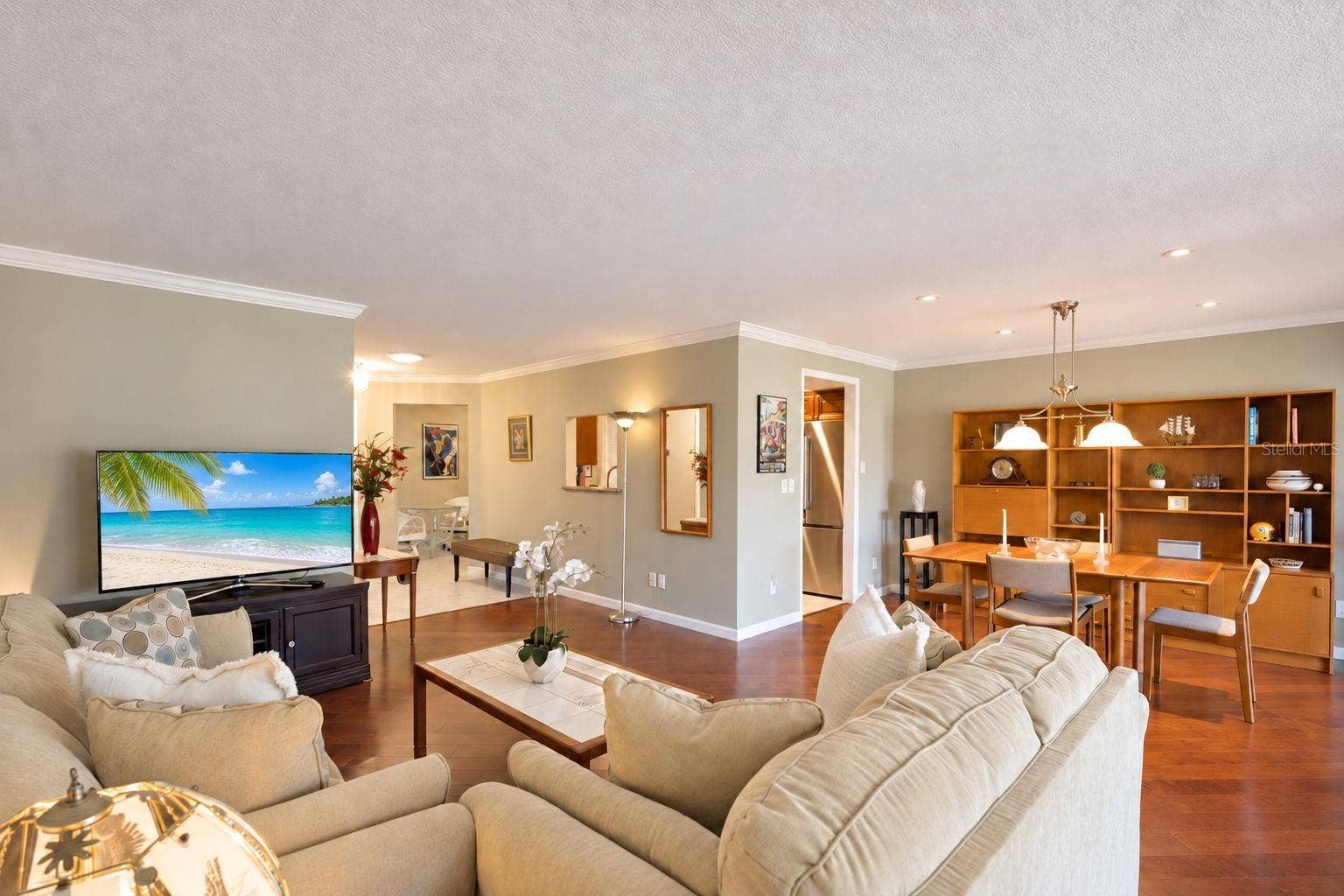 1146 RUSTLEWOOD COURT, Palm Harbor, FL 34684 Living/dining room combo open to kitchen for easy living & entertaining~