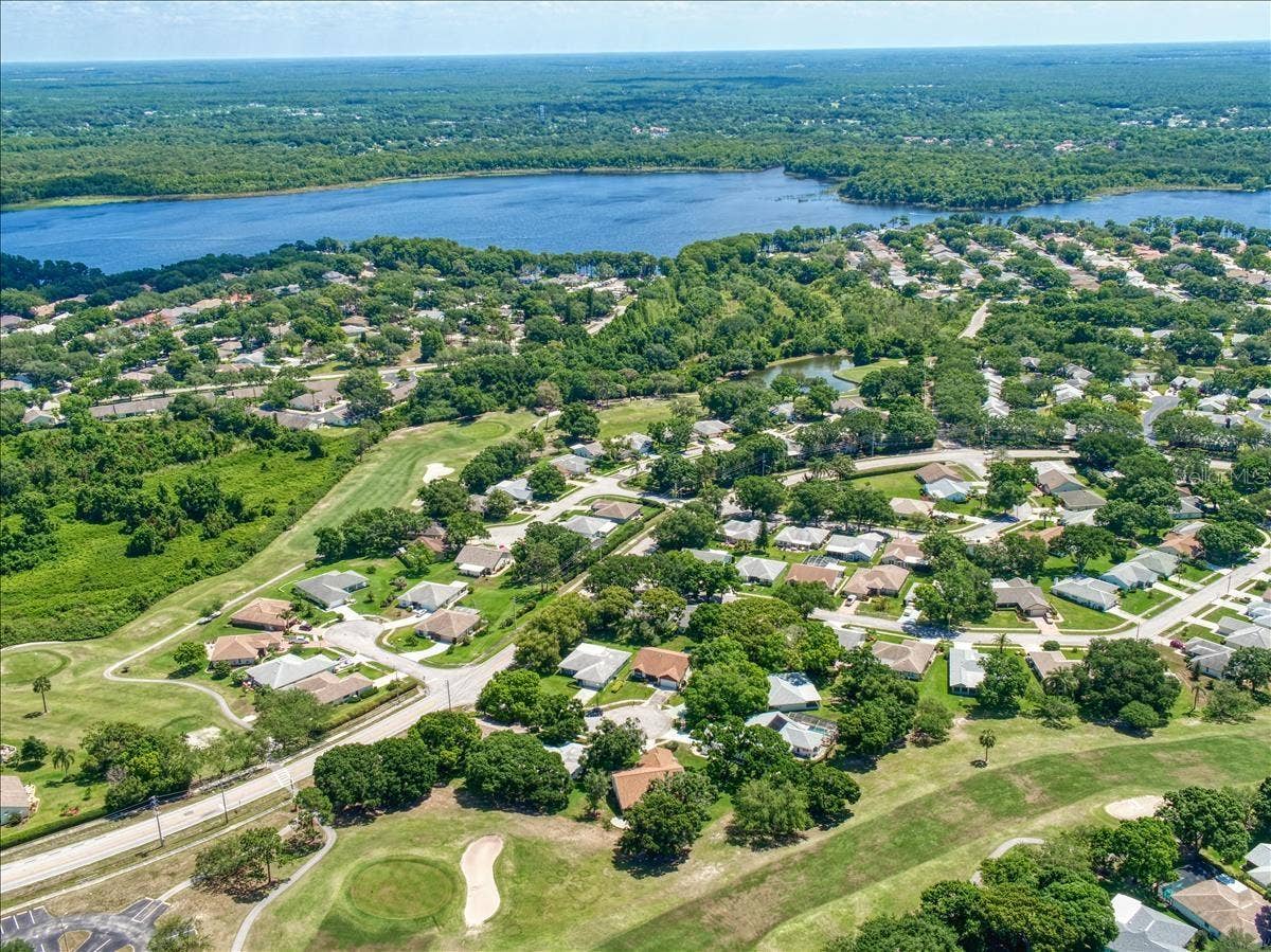 1146 RUSTLEWOOD COURT, Palm Harbor, FL 34684 Over 2,400 homes make up Highland Lakes on Lake Tarpon~