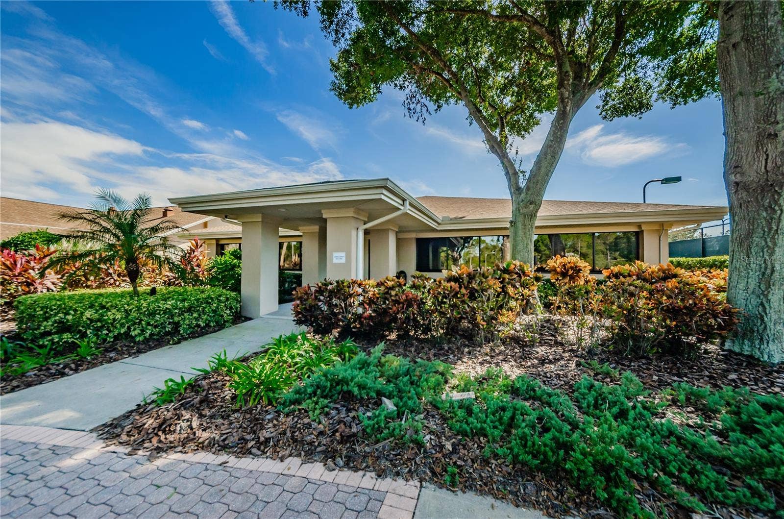 1146 RUSTLEWOOD COURT, Palm Harbor, FL 34684 Arts & Crafts Annex with classes, studios, & a woodshop~