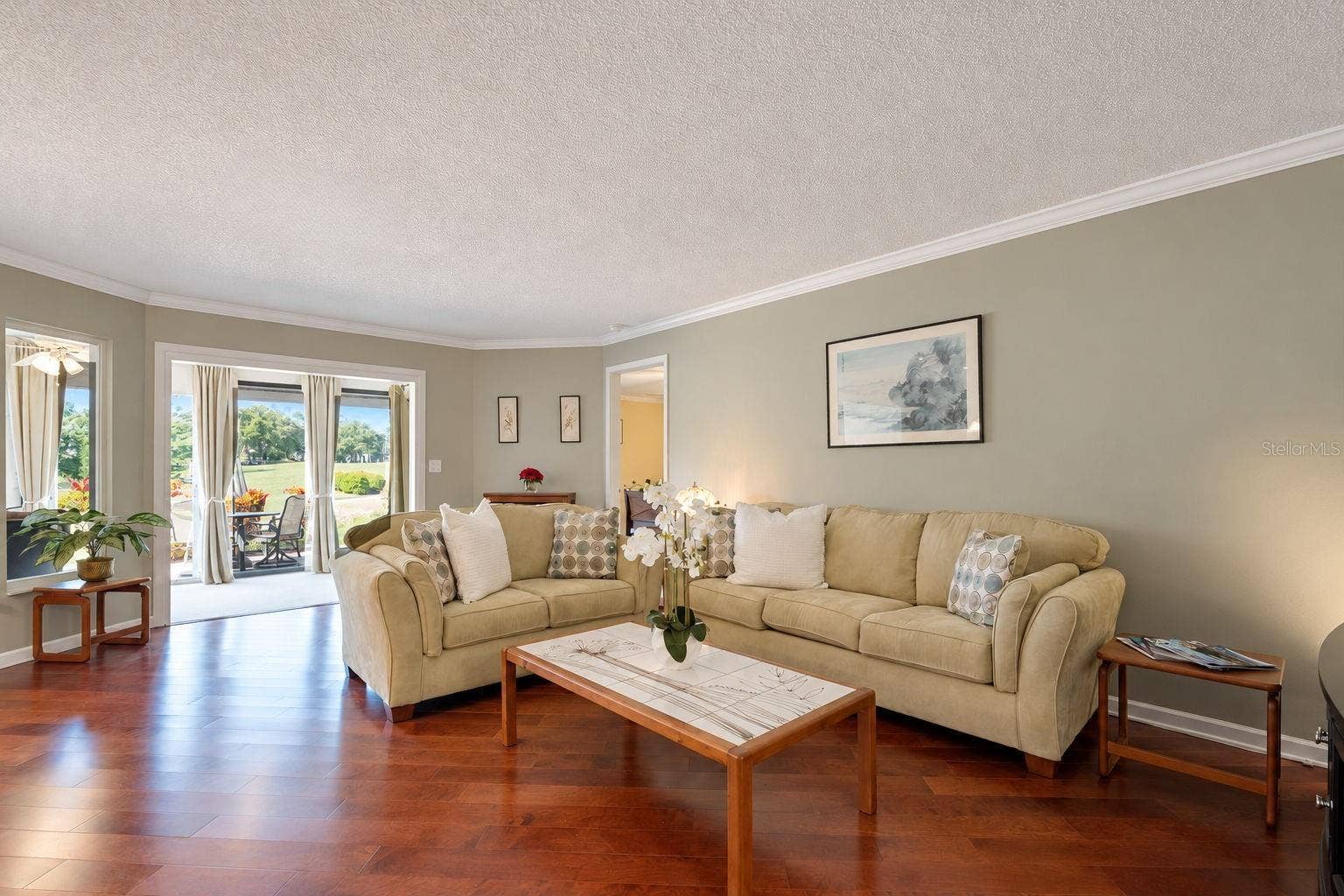 1146 RUSTLEWOOD COURT, Palm Harbor, FL 34684 Beautiful hardwood flooring in the living/dining room combo & elegant crown molding throughout~