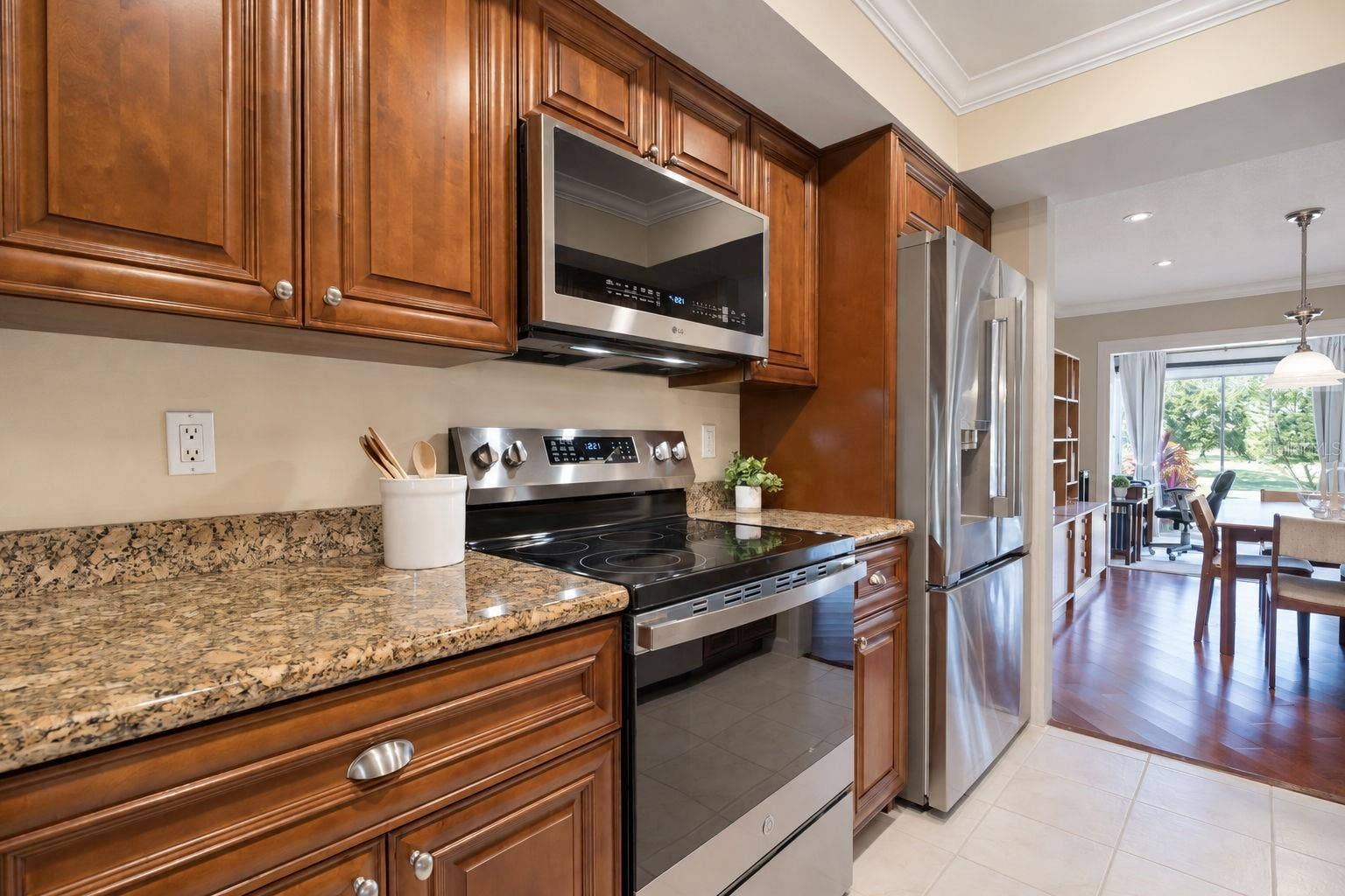 1146 RUSTLEWOOD COURT, Palm Harbor, FL 34684 ALL new or newer "smart" sleek stainless appliances~