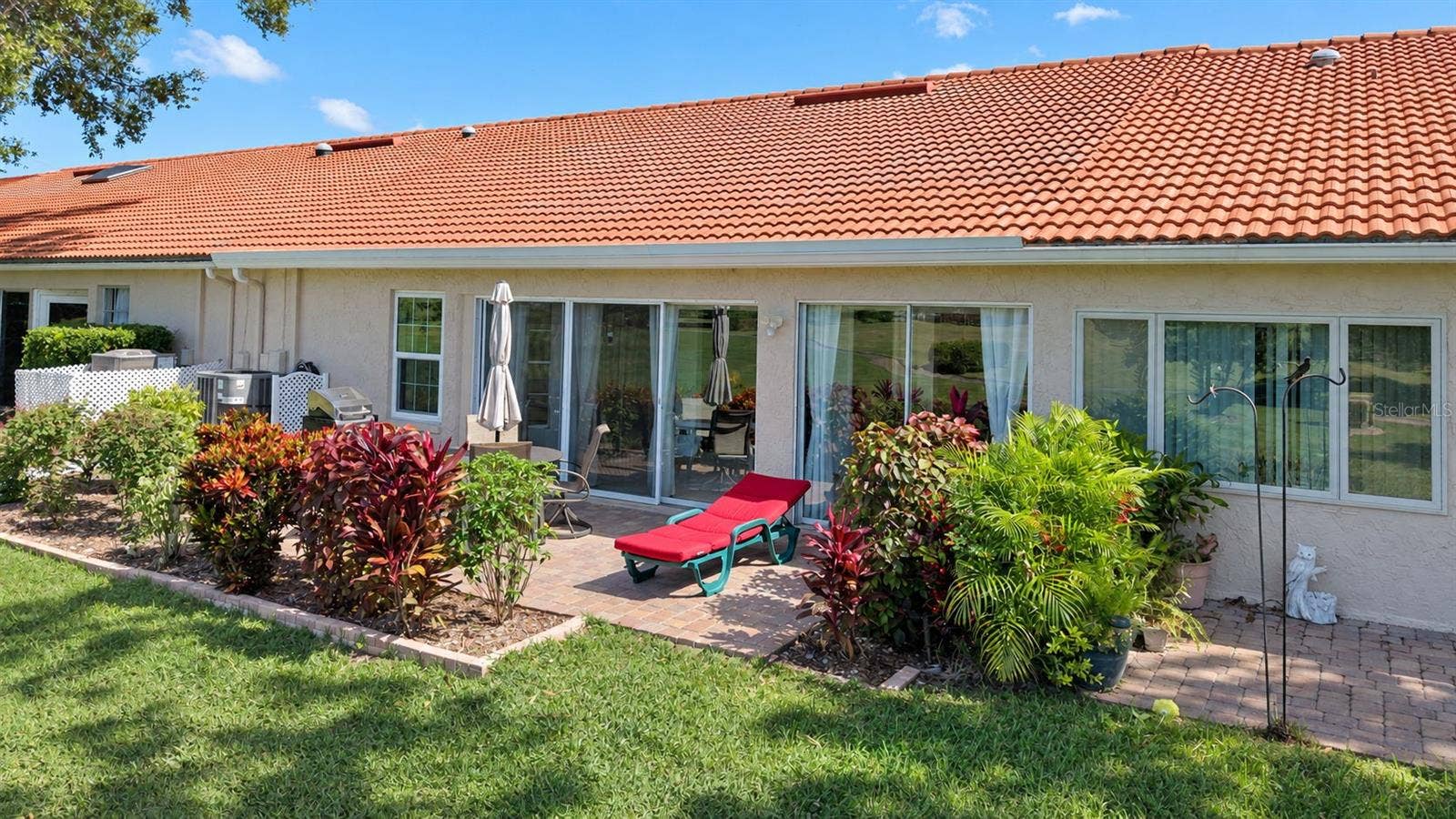 1146 RUSTLEWOOD COURT, Palm Harbor, FL 34684 Beautiful paver patio big enough for outdoor furniture & grill to enjoy year-round~