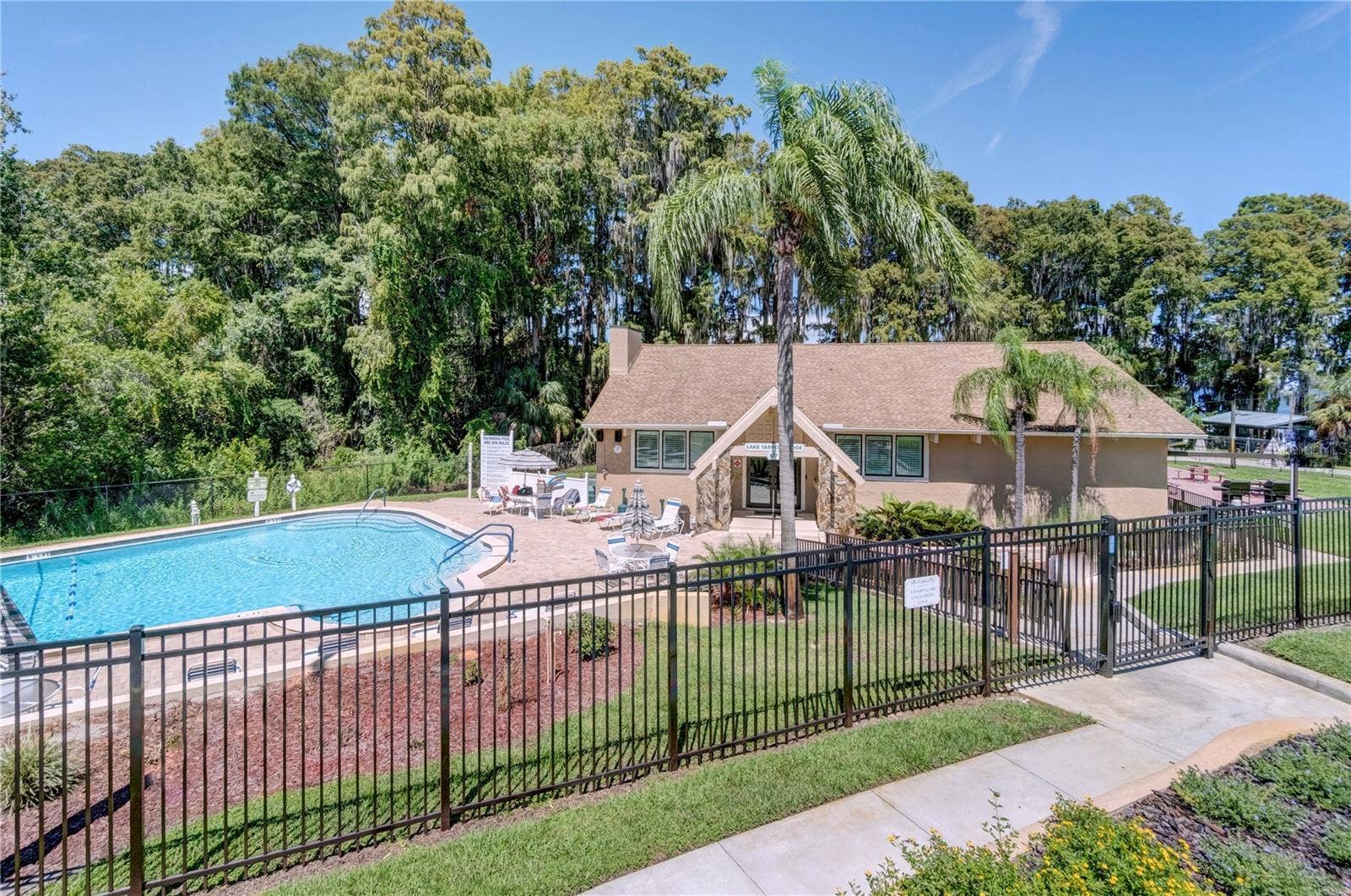 1146 RUSTLEWOOD COURT, Palm Harbor, FL 34684 A 2nd heated pool, party, & picnic facilities, & a fishing pier at the lodge~