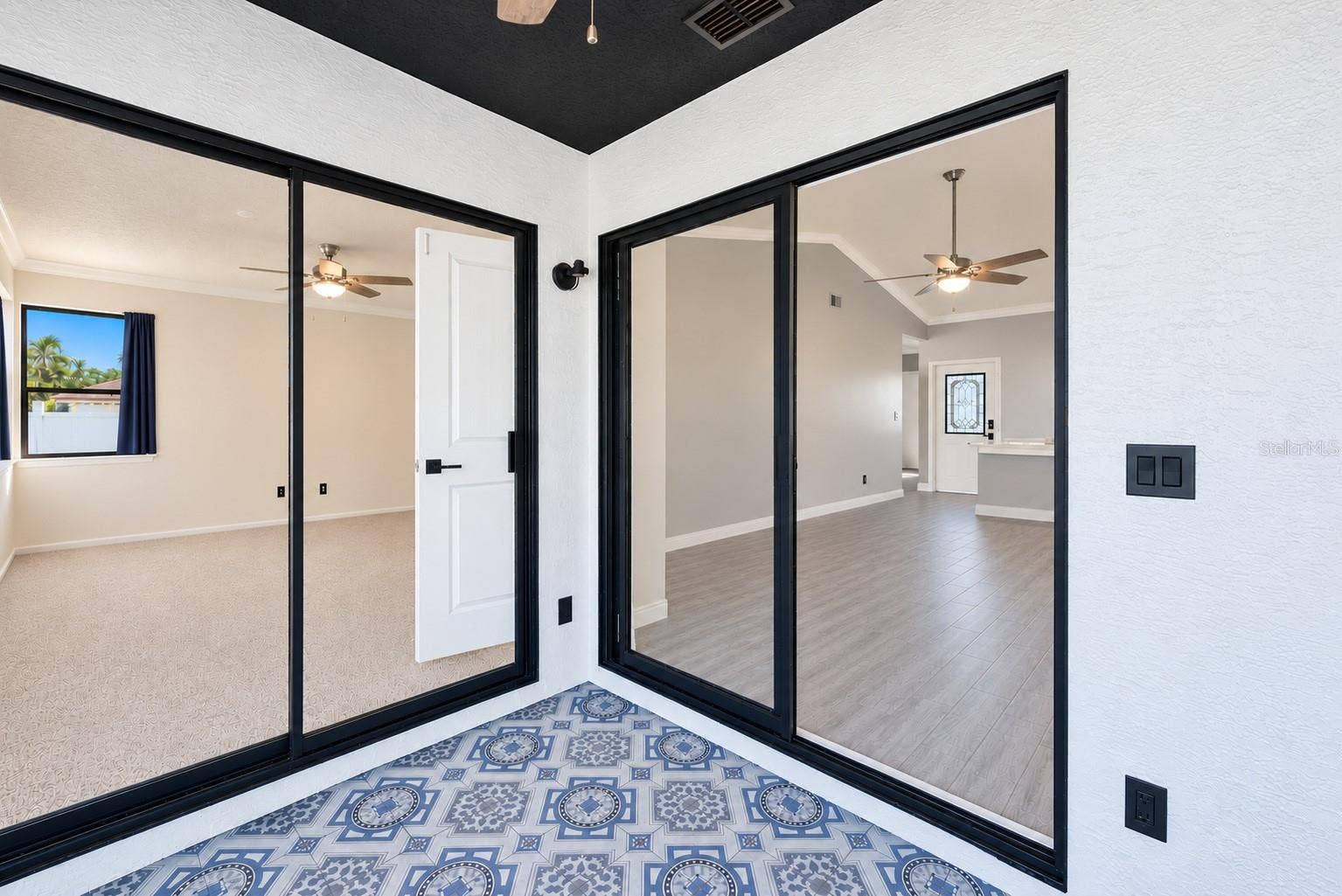 3277 HIBISCUS DRIVE, Palm Harbor, FL 34684 Enclosed patio.