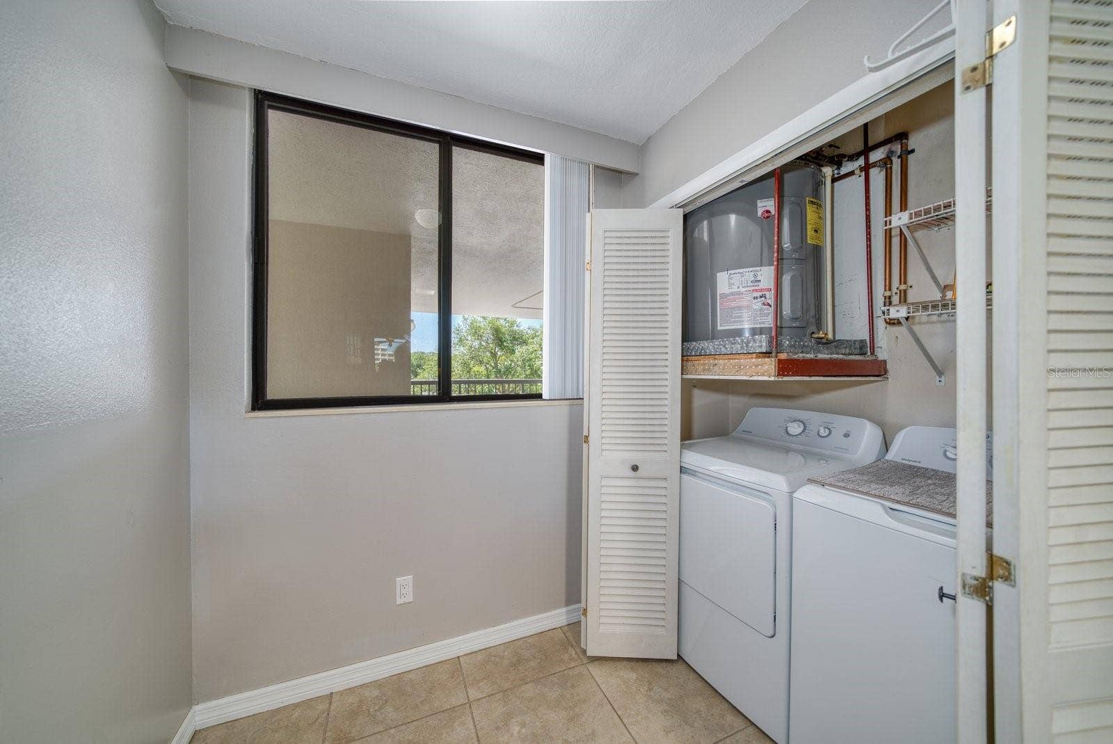 11730 SHIPWATCH DRIVE, #305, Largo, FL 33774 Laundry Closet in unit