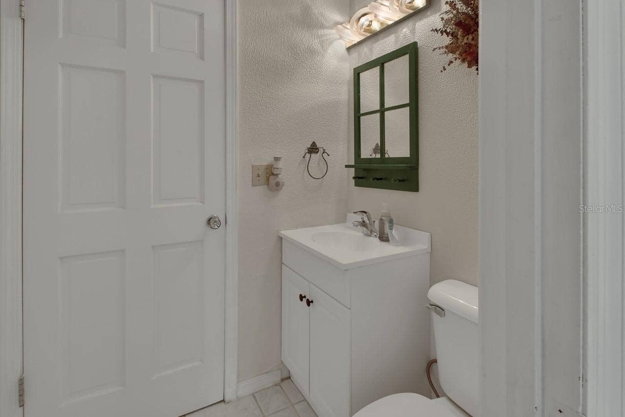 1440 ARROYO VISTA DRIVE, Deland, FL 32724 down stairs 1/2 bath