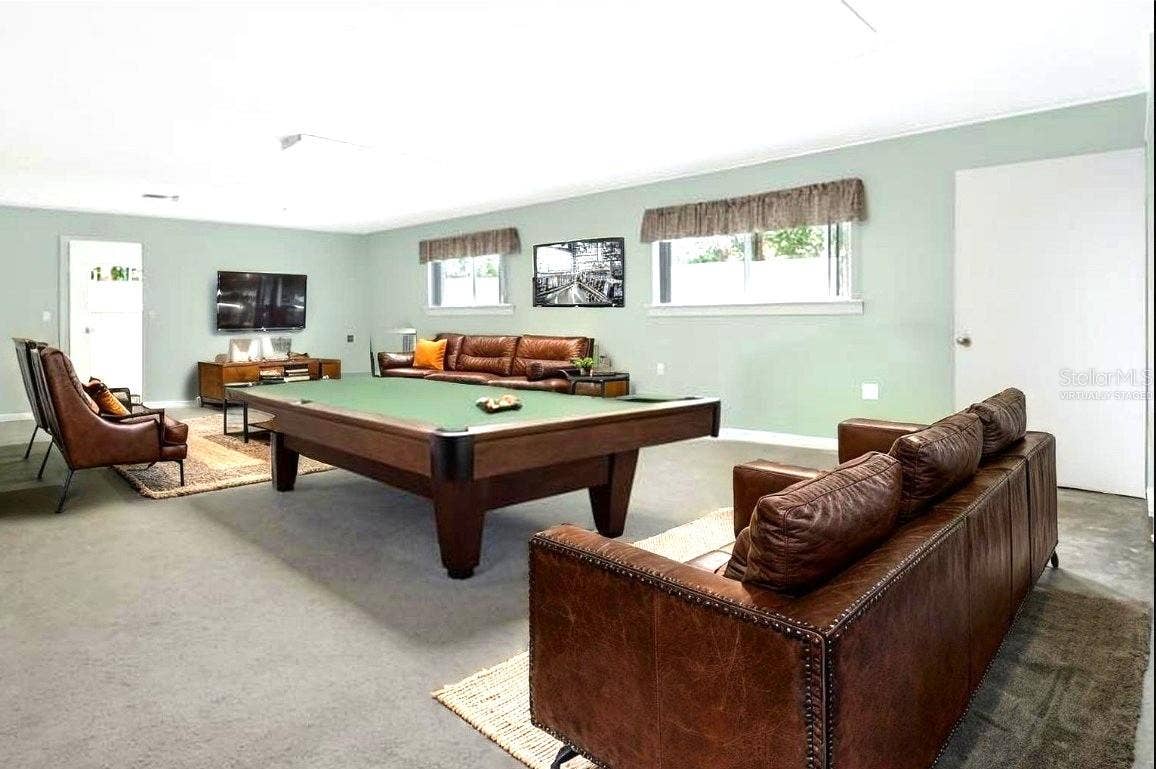 1440 ARROYO VISTA DRIVE, Deland, FL 32724 virtually staged game room on the 2nd floor