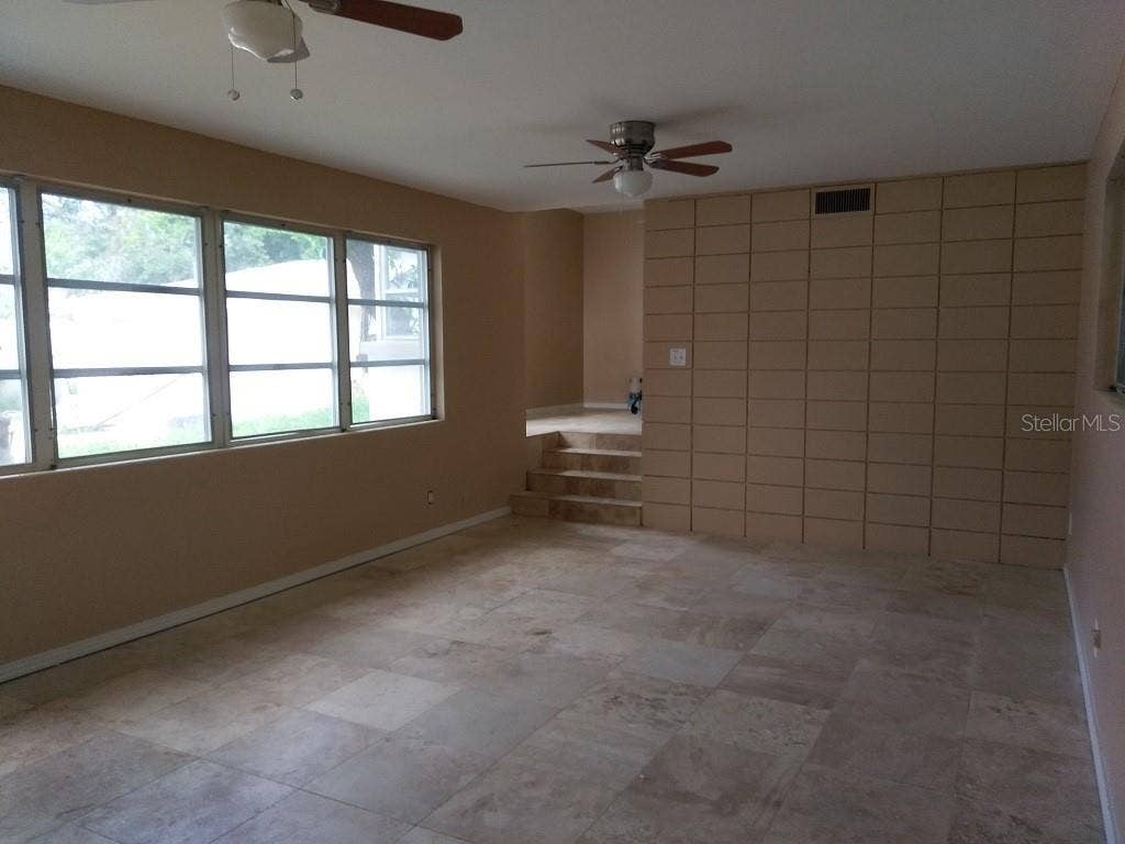 724 N OLEANDER AVENUE, Daytona Beach, FL 32118 Living room looking towards kitchen