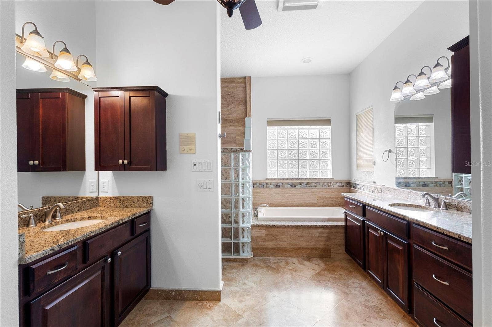 73 SANCTUARY AVENUE, Debary, FL 32713 PRIMARY BATHROOM WITH TRAVERTINE FLOOR