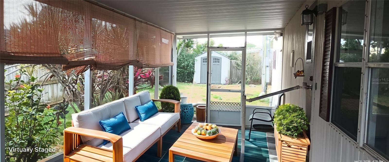 5321 CHRISTIANCY AVENUE, Port Orange, FL 32127 virtually staged screened porch