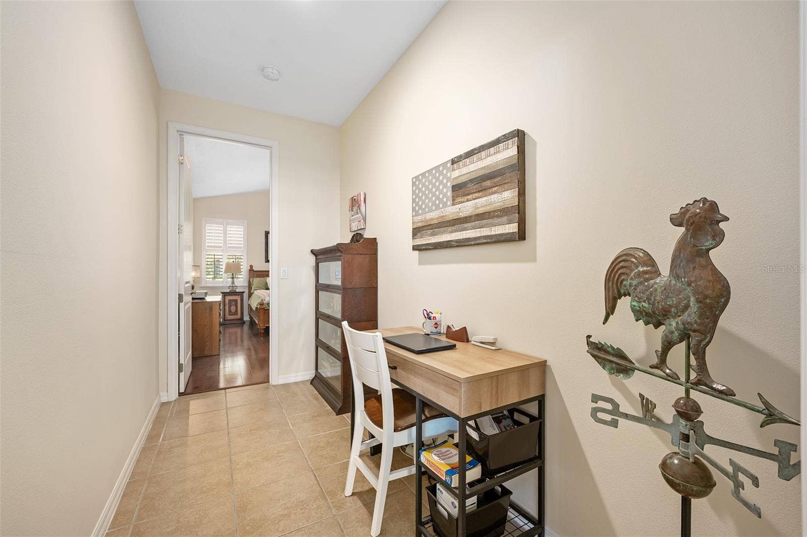 372 CHELSEA PLACE AVENUE, Ormond Beach, FL 32174 Area between living room and primary bedroom offers many possibilities