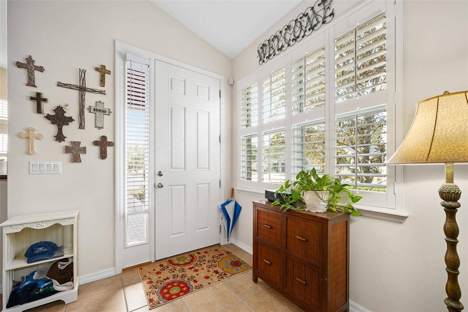 372 CHELSEA PLACE AVENUE, Ormond Beach, FL 32174 Sidelight adds natural lighting, Plantation shutters