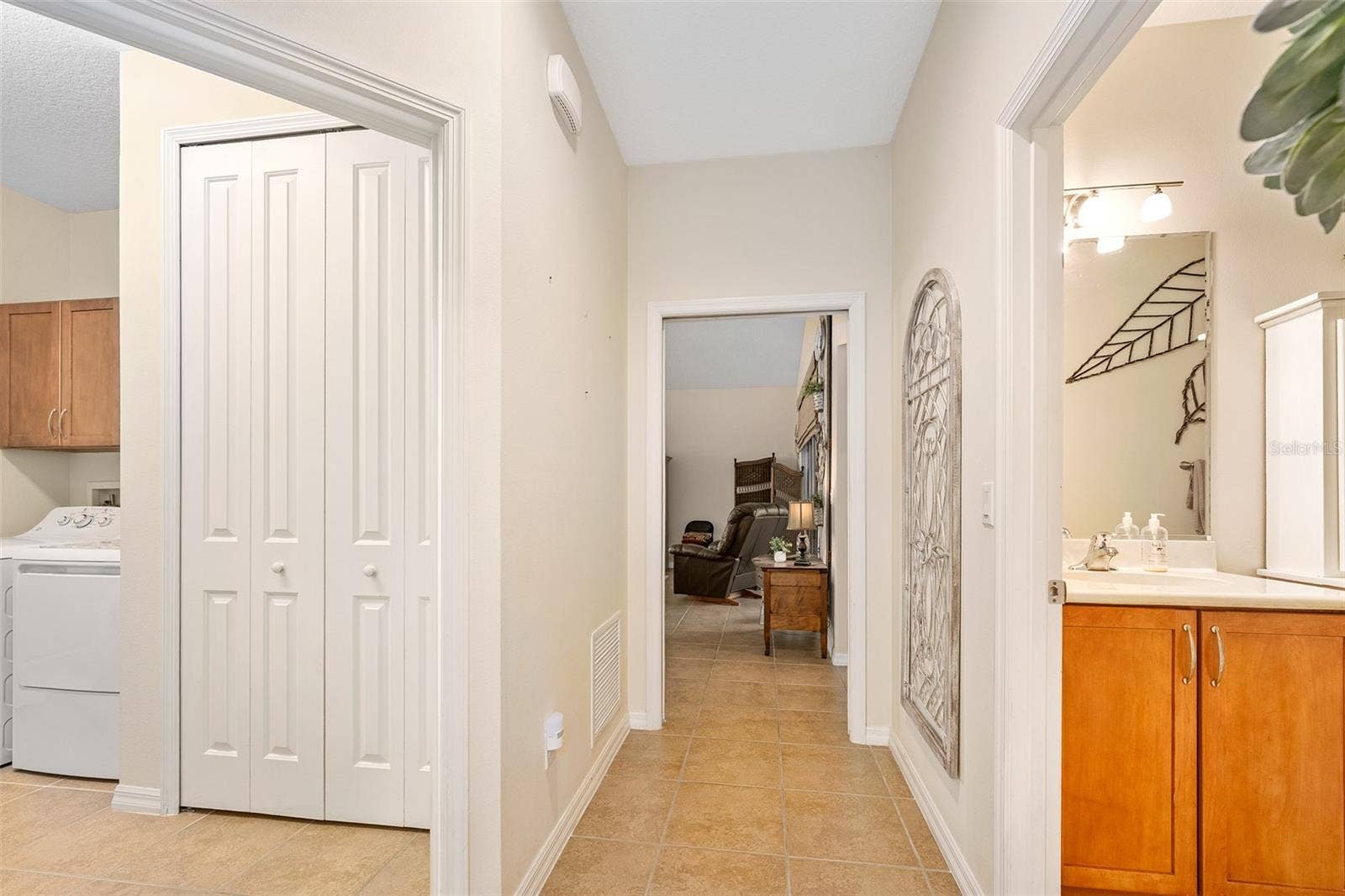 372 CHELSEA PLACE AVENUE, Ormond Beach, FL 32174 Hallway from bedrooms to family room