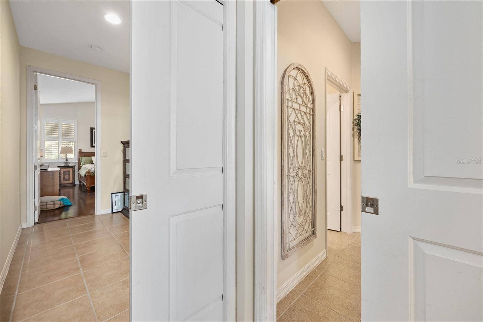 372 CHELSEA PLACE AVENUE, Ormond Beach, FL 32174 Pocket doors close off hallways