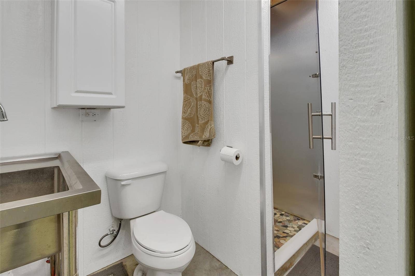 4611 GRAND AVENUE, De Leon Springs, FL 32130 Bathroom inside outbuilding