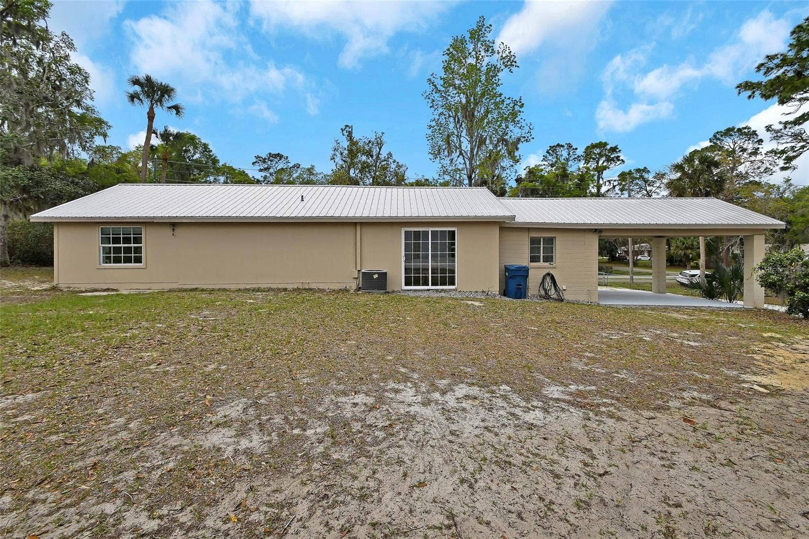 4611 GRAND AVENUE, De Leon Springs, FL 32130 Home #1 Back View