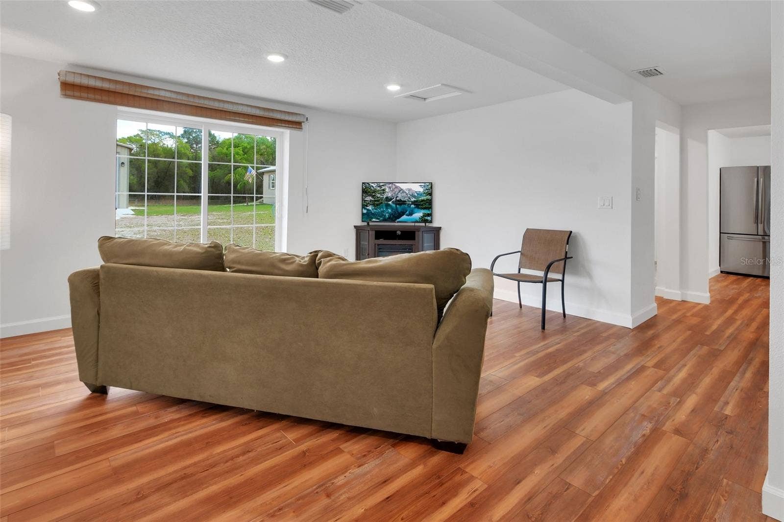 4611 GRAND AVENUE, De Leon Springs, FL 32130 Home #1 Living Room