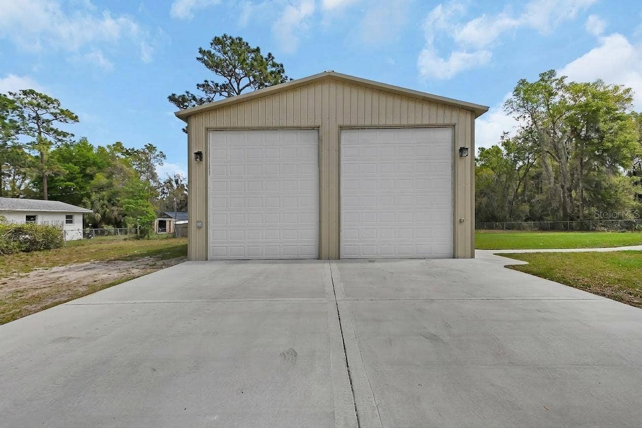 4611 GRAND AVENUE, De Leon Springs, FL 32130 32x55 Insulated outbuilding/ AC too!