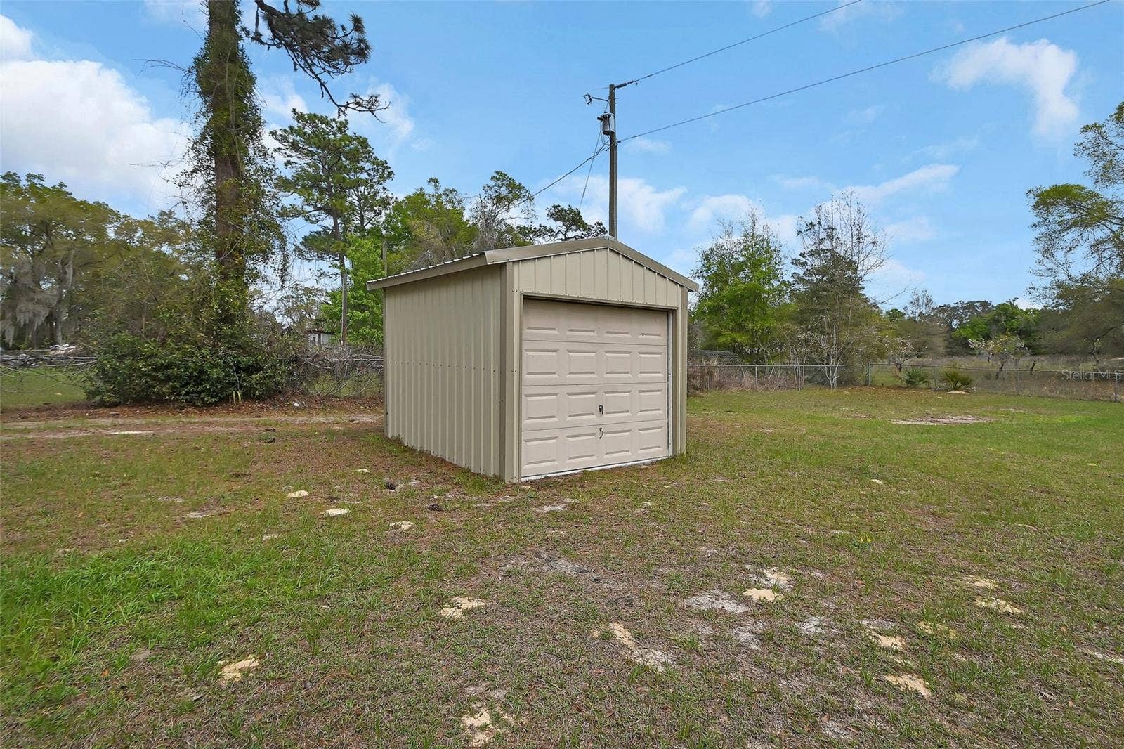 4611 GRAND AVENUE, De Leon Springs, FL 32130 shed