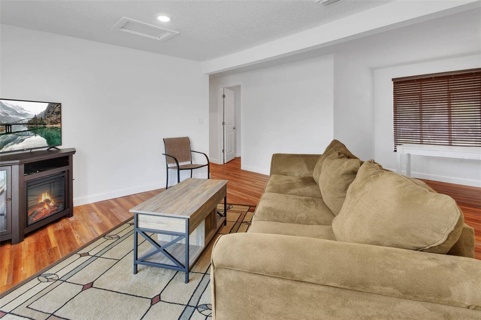 4611 GRAND AVENUE, De Leon Springs, FL 32130 Home #1 Living Room
