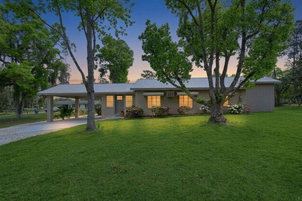 4611 GRAND AVENUE, De Leon Springs, FL 32130 Home #1 Night Shot