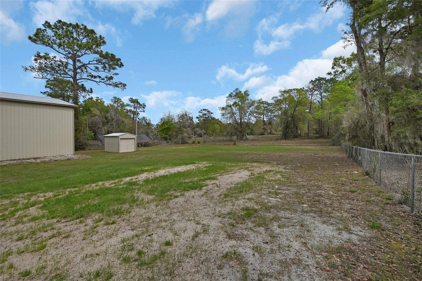 4611 GRAND AVENUE, De Leon Springs, FL 32130 shot looking to the back of property