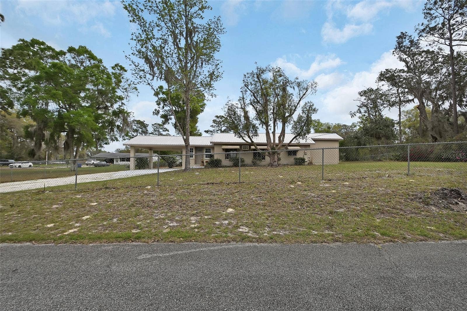 4611 GRAND AVENUE, De Leon Springs, FL 32130 Hone #1 Street Shot