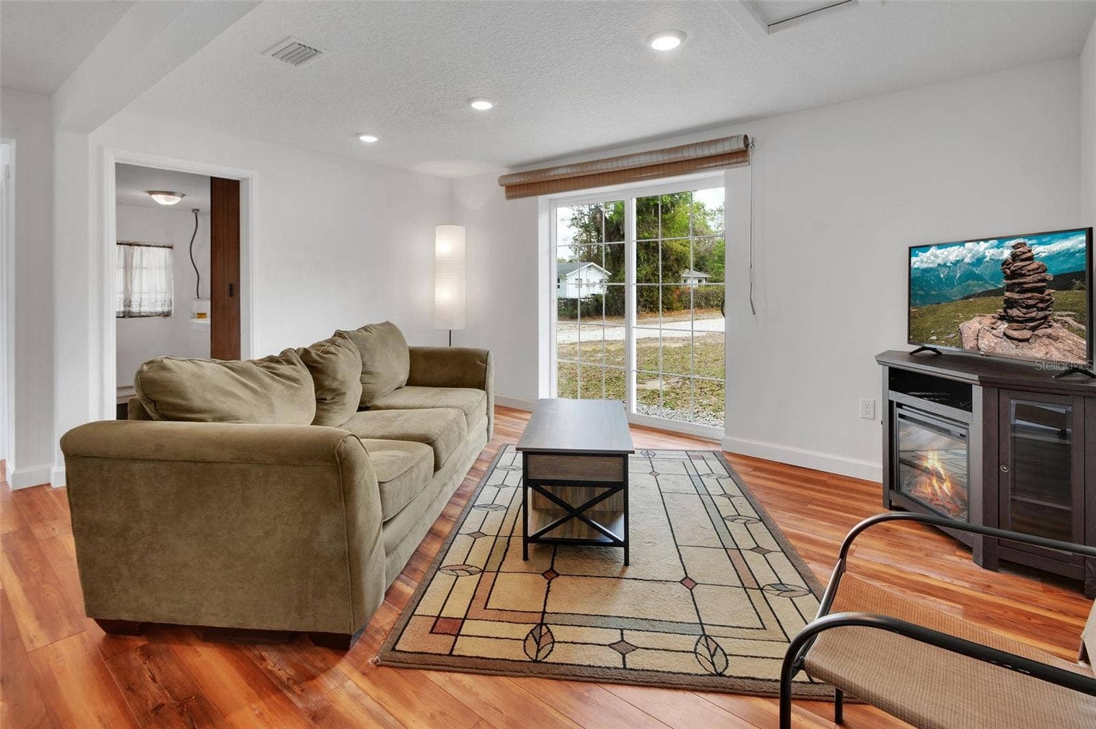 4611 GRAND AVENUE, De Leon Springs, FL 32130 Home #1 Living Room