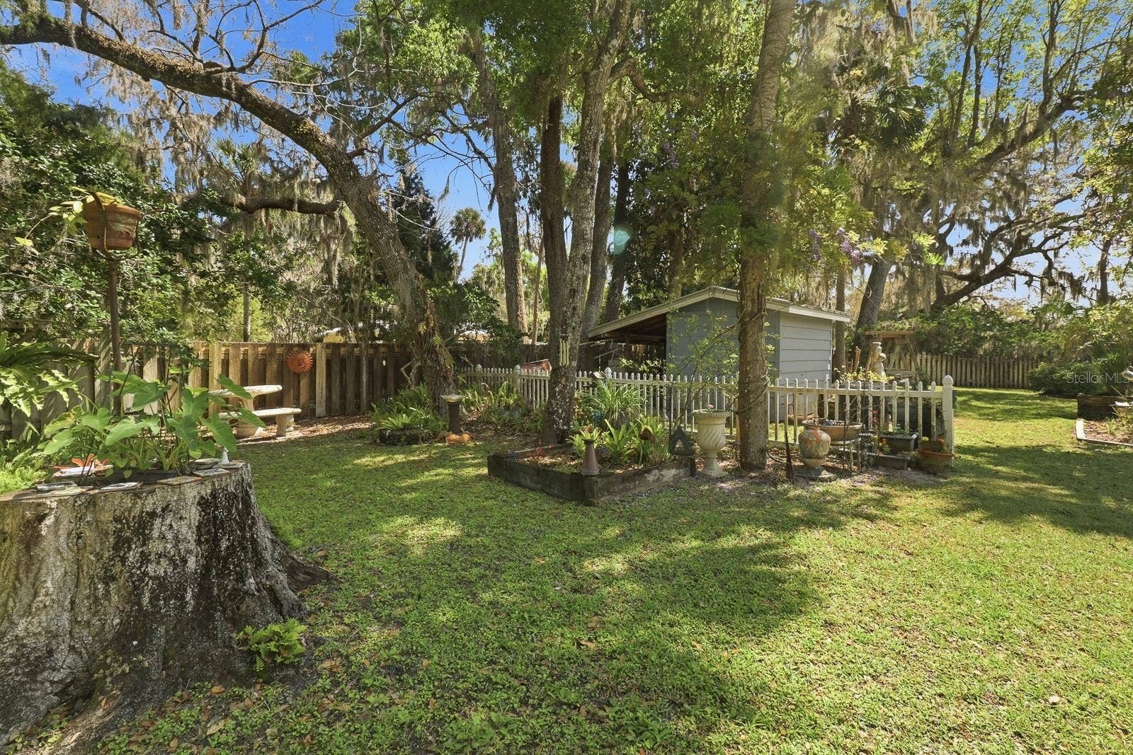 6491 SPRUCE CREEK ROAD, Port Orange, FL 32127 Storage shed and housing for all pool equipment.