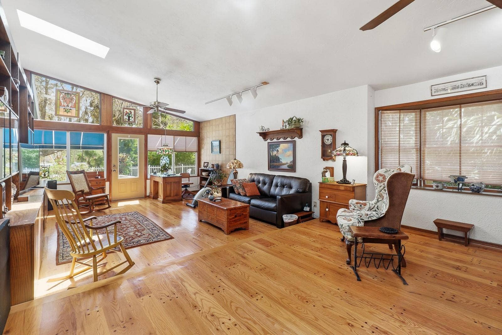 6491 SPRUCE CREEK ROAD, Port Orange, FL 32127 This space can also double as an in-law suite! Complete with private entrance, kitchen, and full bathroom.
