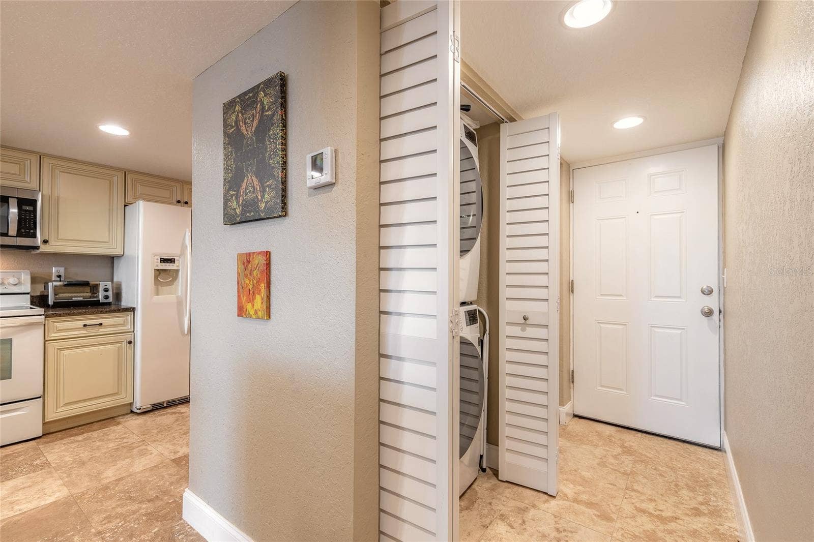 3131 S RIDGEWOOD AVENUE, #101, South Daytona, FL 32119 Stackable Washer & Dryer