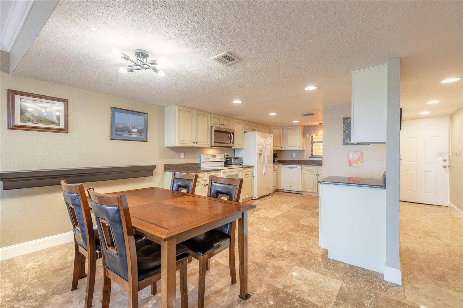 3131 S RIDGEWOOD AVENUE, #101, South Daytona, FL 32119 Dining Area to Kitchen