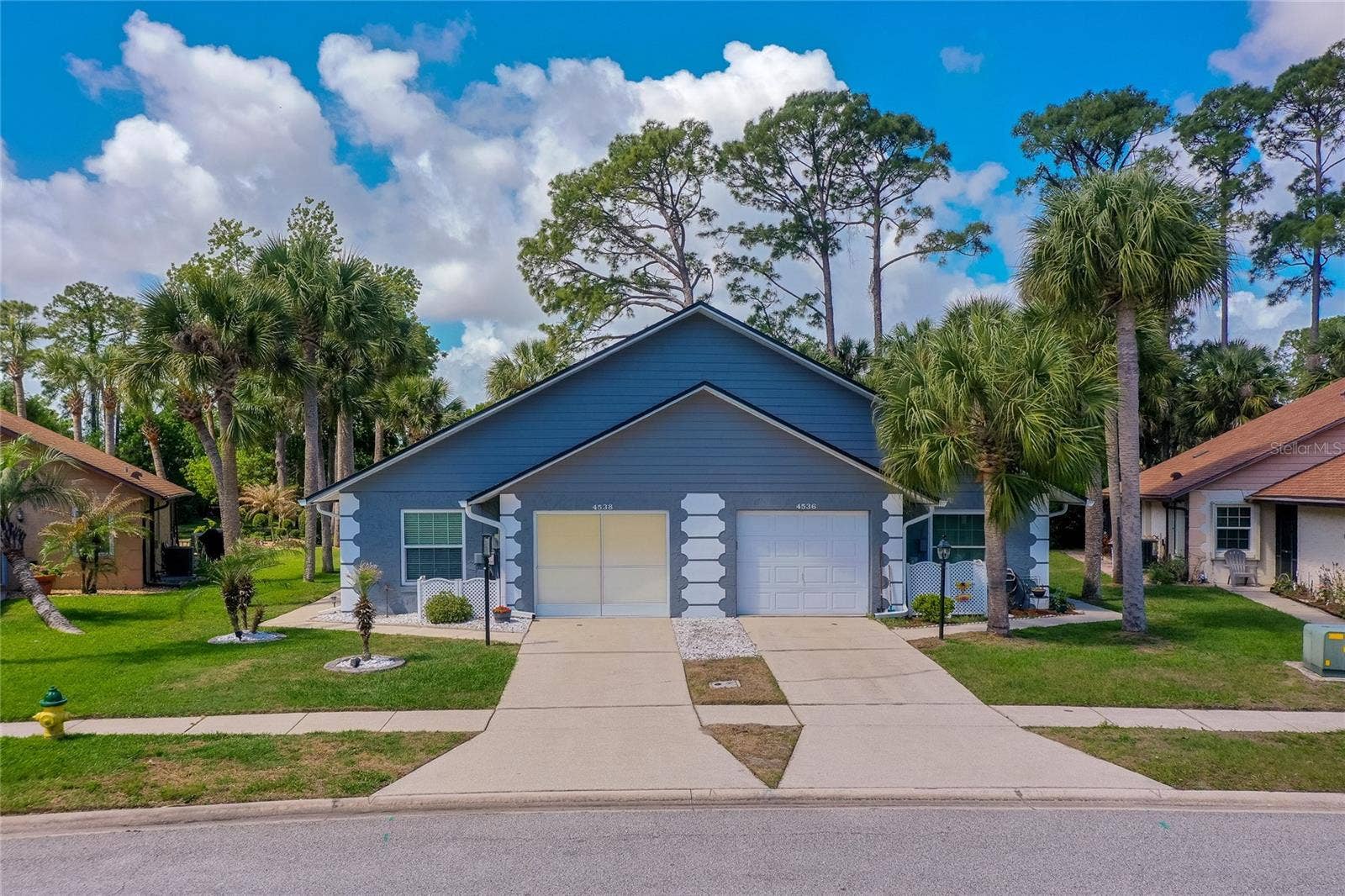 4538 ROCKLEDGE LANE, Port Orange, FL 32127 4538 Rockledge Lane on the left.