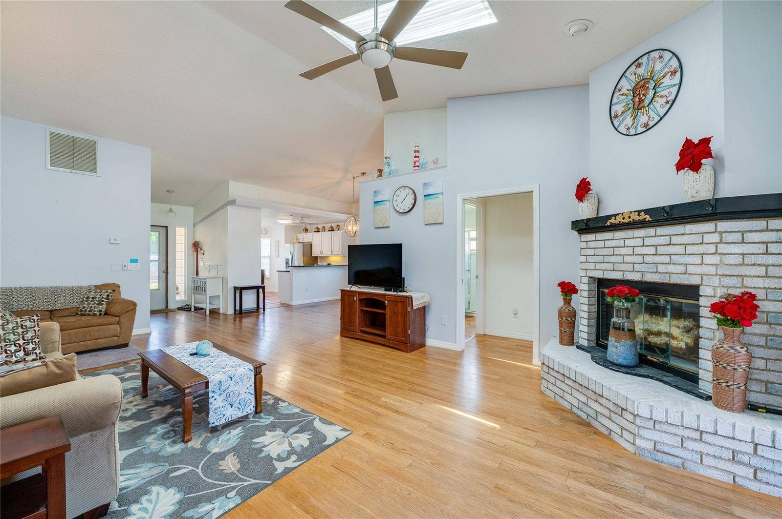 1312 N WEMBLEY CIRCLE, Port Orange, FL 32128 Living room with wood-burning fireplace