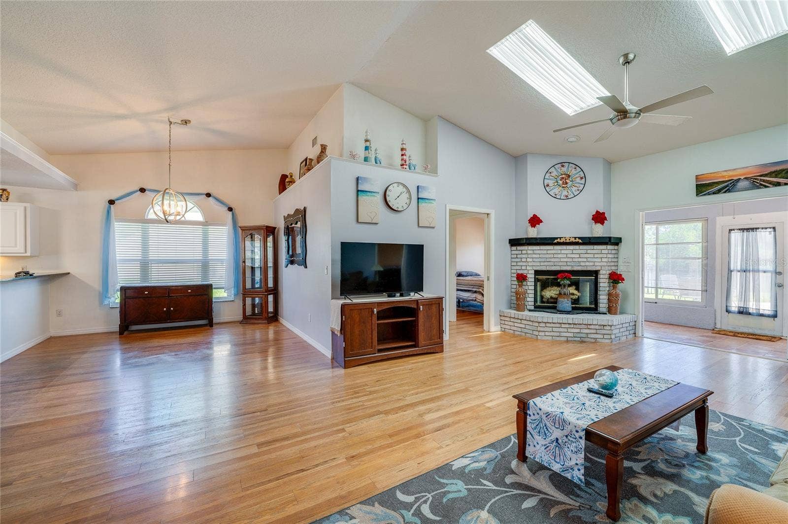 1312 N WEMBLEY CIRCLE, Port Orange, FL 32128 Dining area and living room