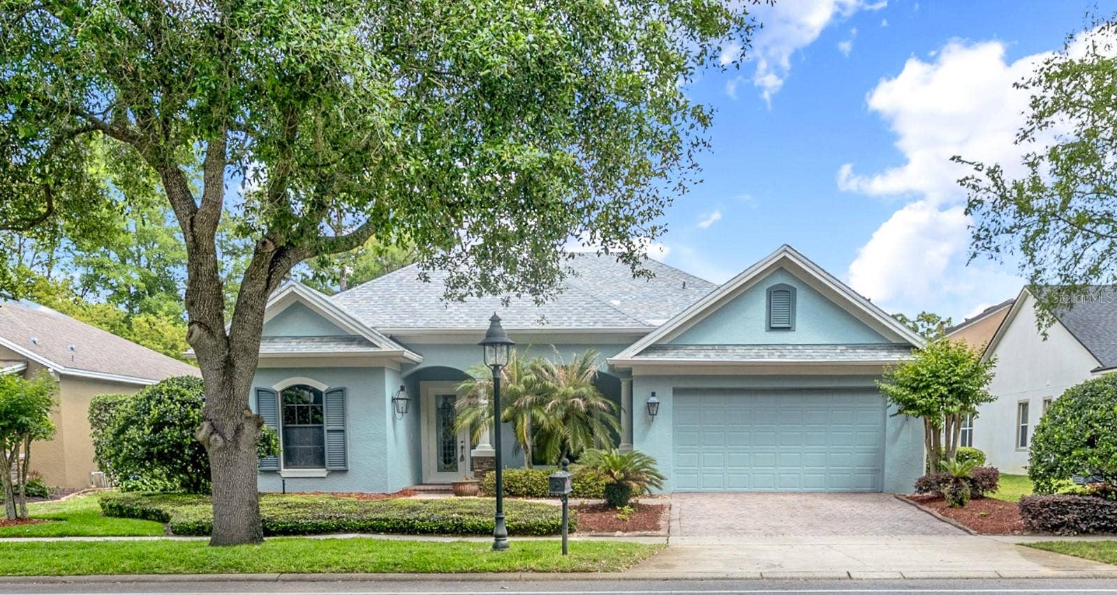 607 VICTORIA HILLS DRIVE, Deland, FL 32724 Exterior Front w/3 Car Tandem Garage