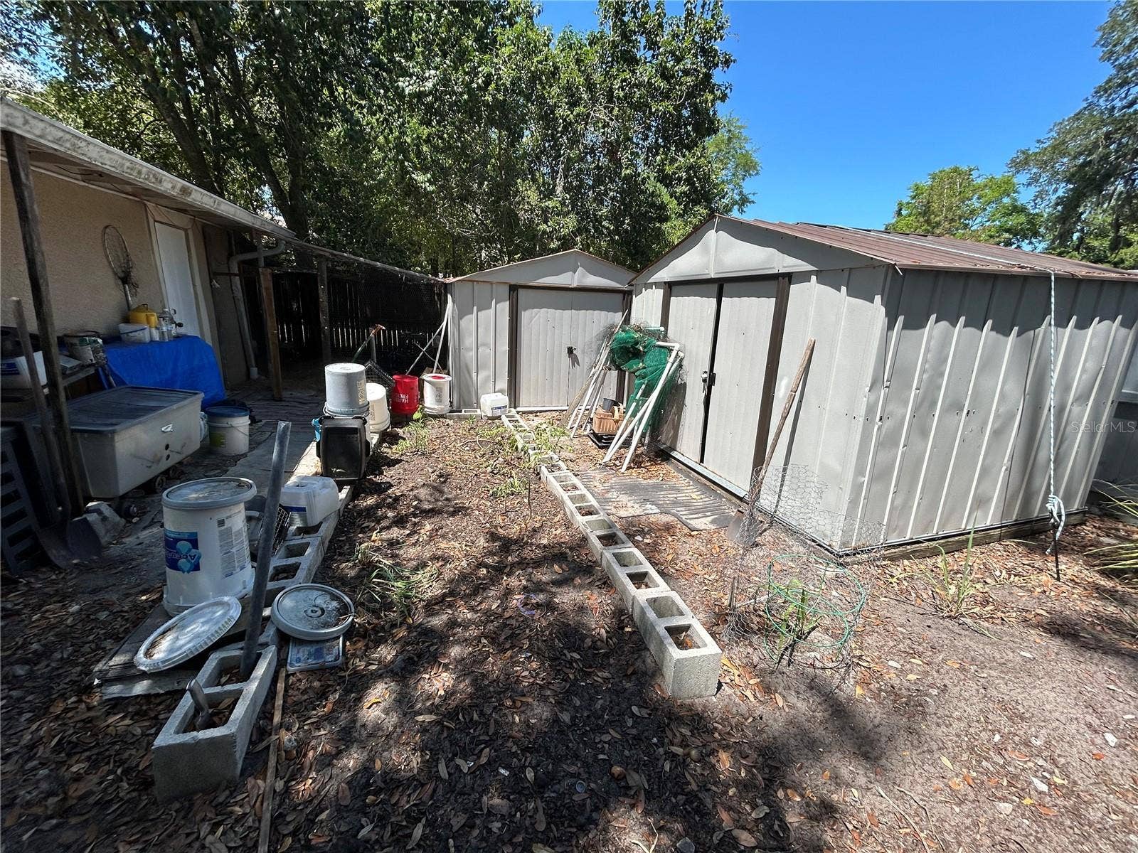 629 HOLMES AVENUE, Daytona Beach, FL 32114 Rear Yard with storage