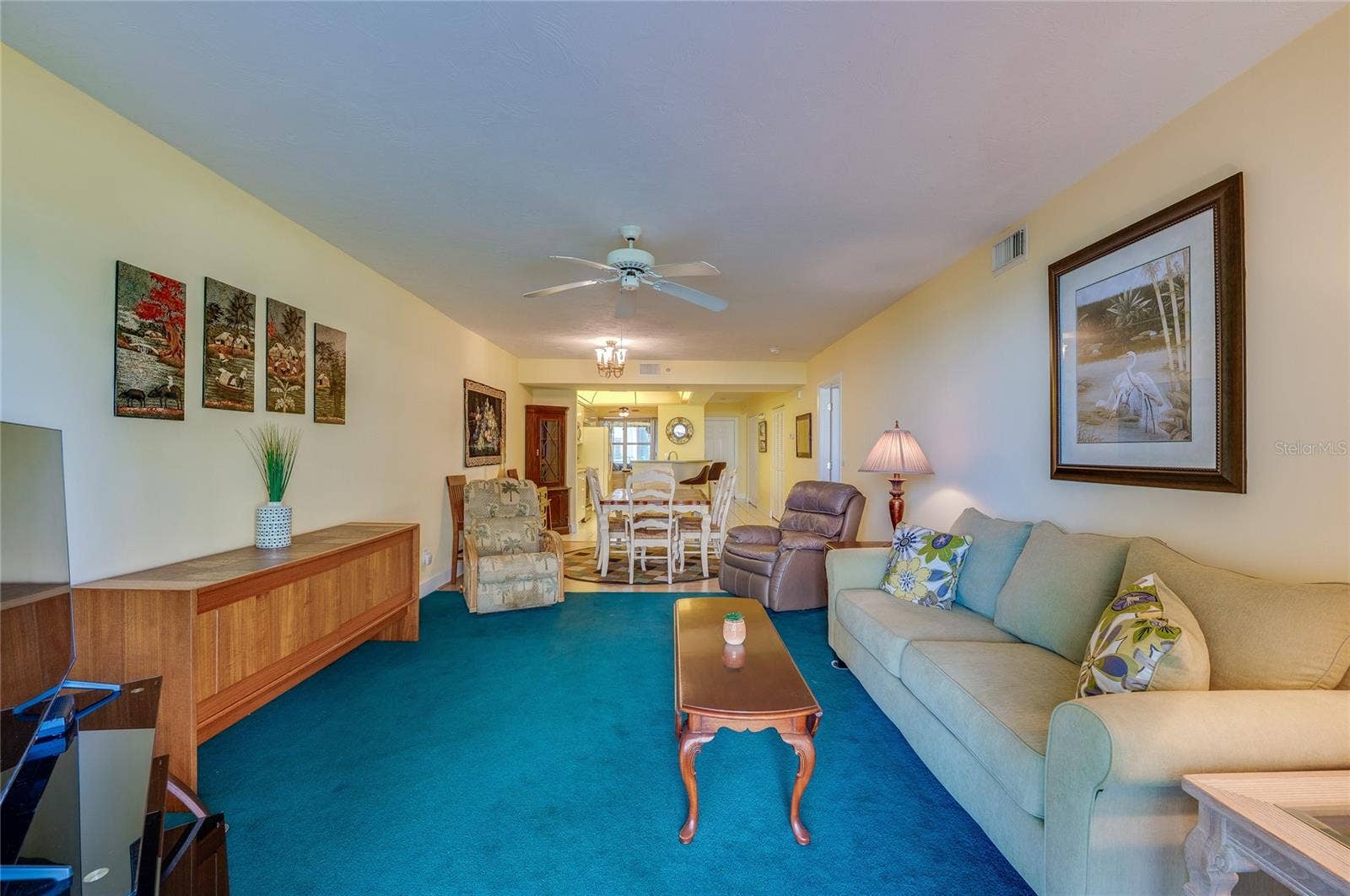 4575 S ATLANTIC AVENUE, #6101, Port Orange, FL 32127 An open-concept layout connects the living and dining areas, creating a cohesive space perfect for everyday living and gatherings.