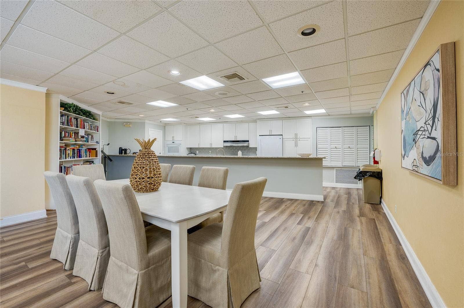 4575 S ATLANTIC AVENUE, #6101, Port Orange, FL 32127 Open dining space with multiple tables and seating, perfect for hosting events or casual meals.