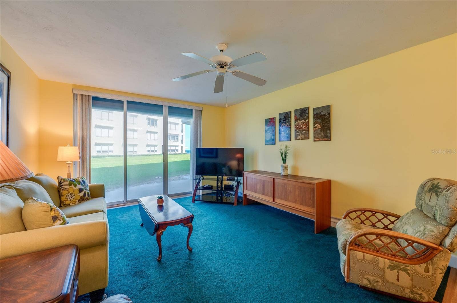 4575 S ATLANTIC AVENUE, #6101, Port Orange, FL 32127 Another perspective highlights the spacious layout, ideal for both relaxing and hosting, with plenty of room for seating and media setup.