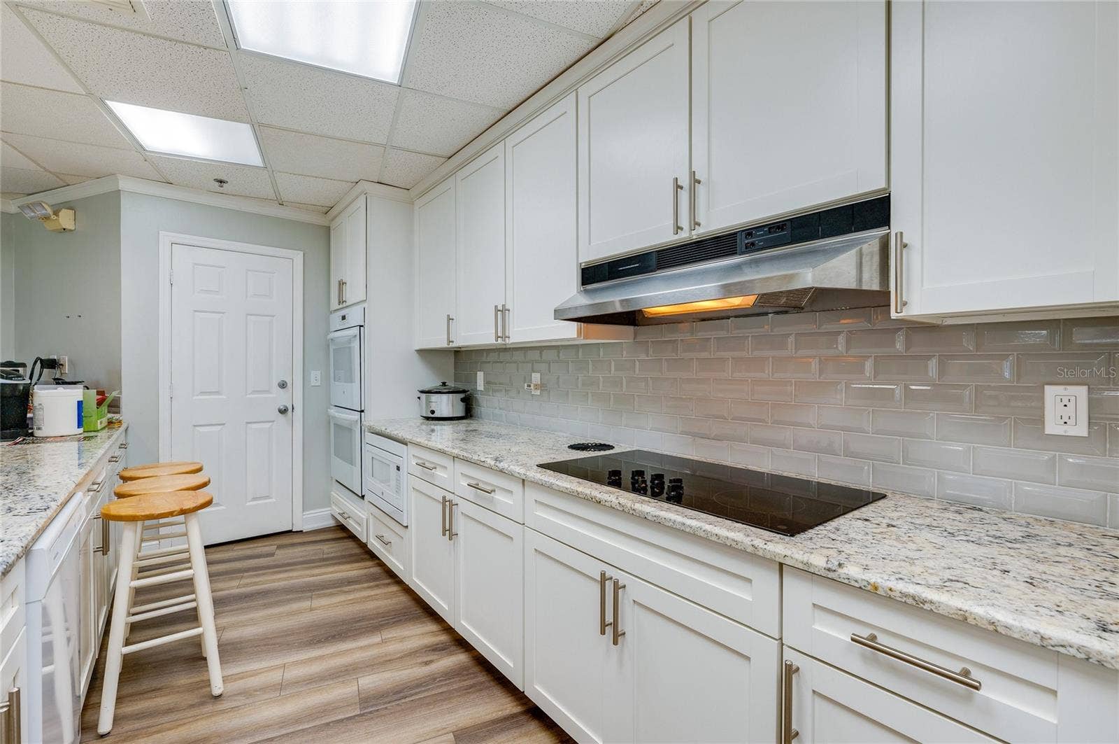 4575 S ATLANTIC AVENUE, #6101, Port Orange, FL 32127 Functional layout with modern appliances, extensive prep space, and clean finishes designed for shared use.