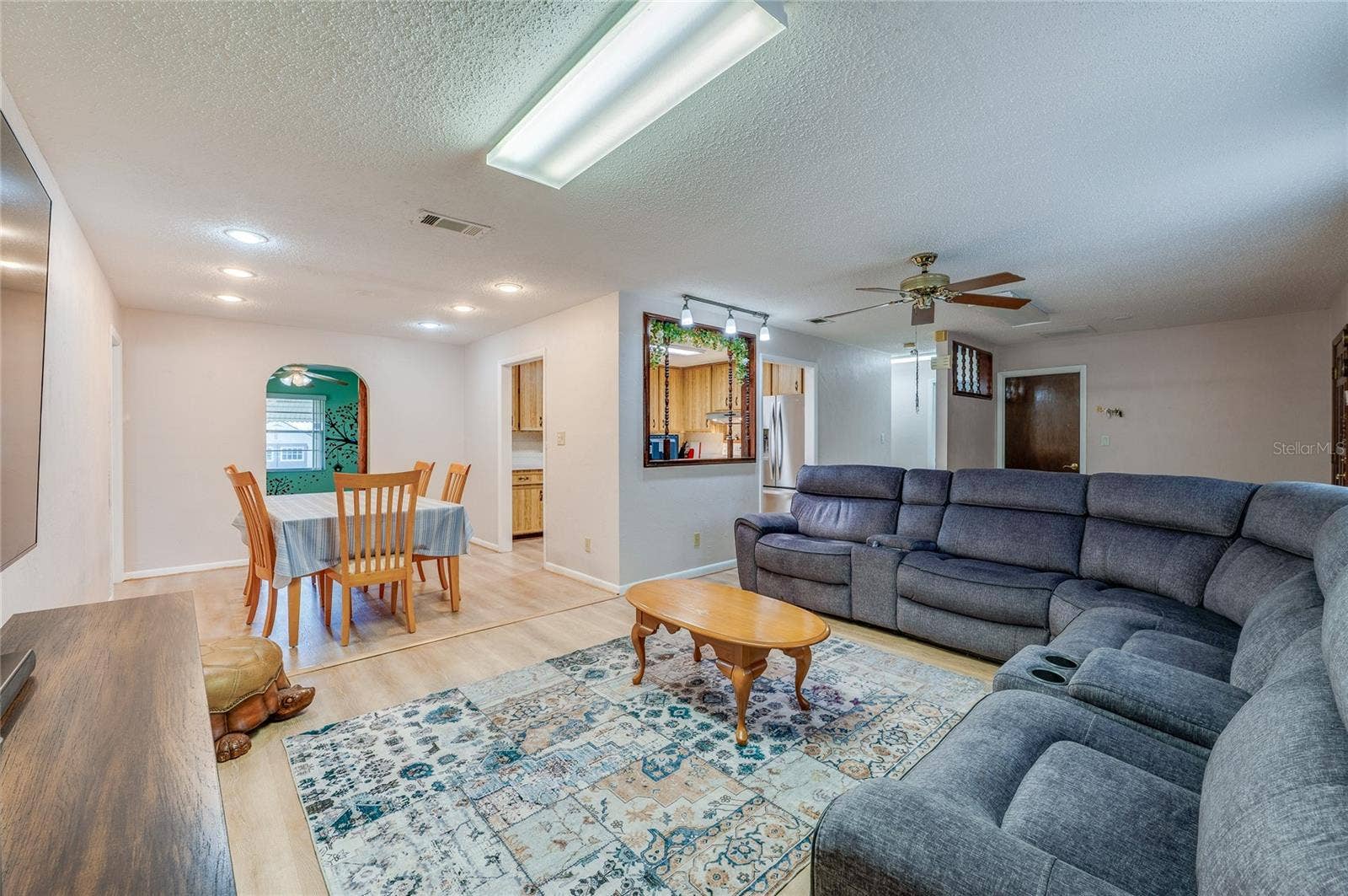 667 GEORGE MILLER CIRCLE, Port Orange, FL 32127 Living room and dining area