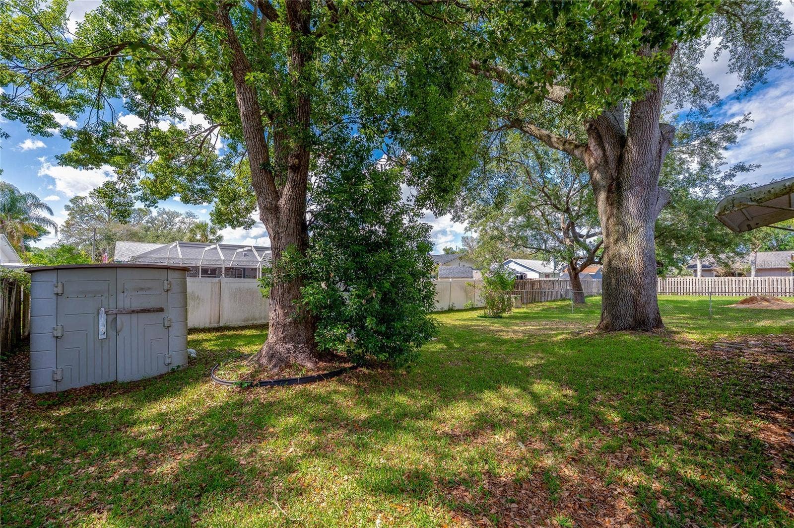667 GEORGE MILLER CIRCLE, Port Orange, FL 32127 Shed in backyard