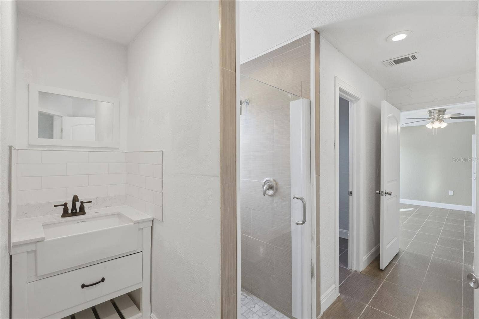 5414 RIVERSIDE DRIVE, Port Orange, FL 32127 Second bedroom with its own bathroom on the first floor.