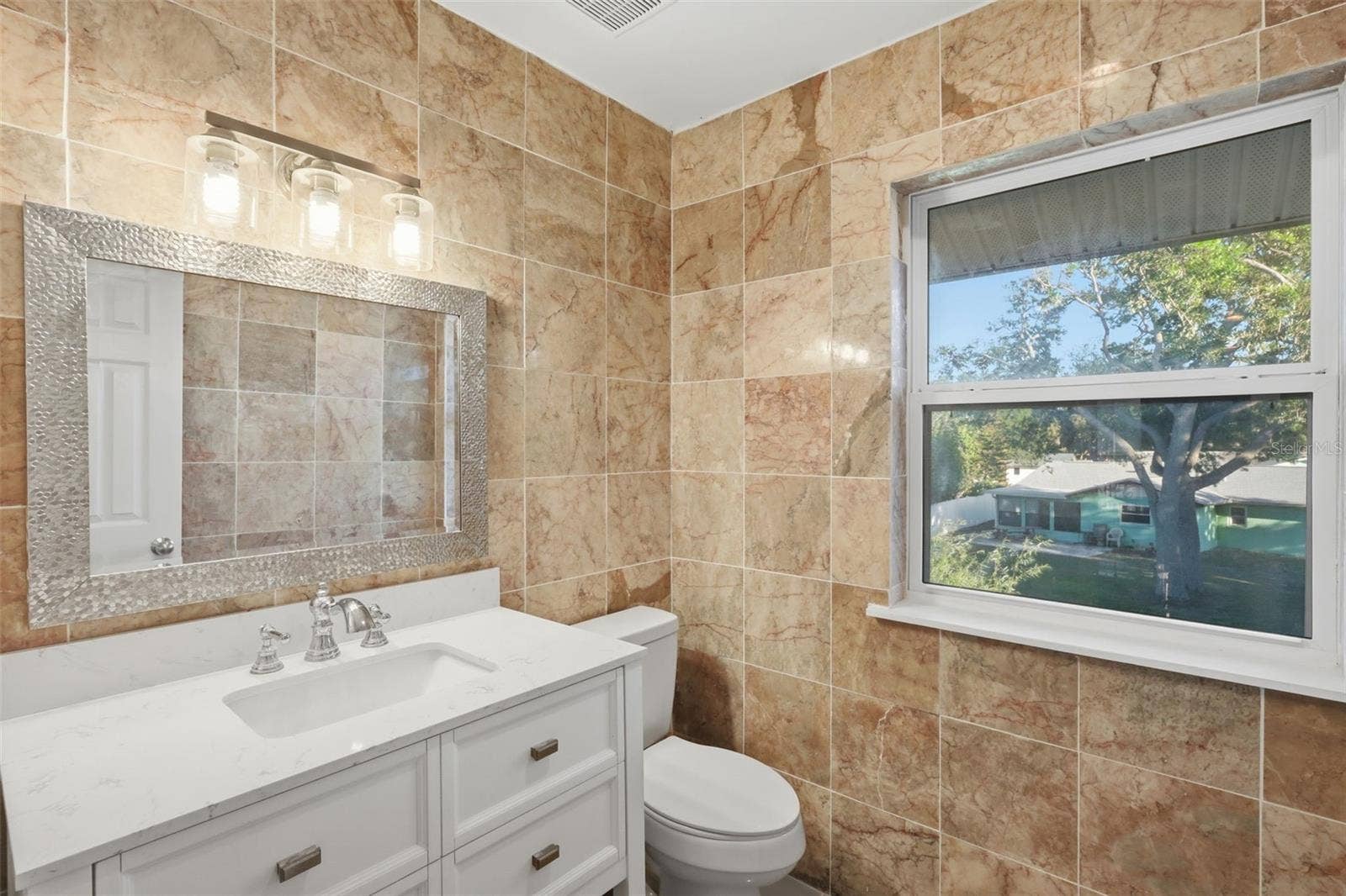 5414 RIVERSIDE DRIVE, Port Orange, FL 32127 Half Bath just outside from the Family Room on the 2nd Floor