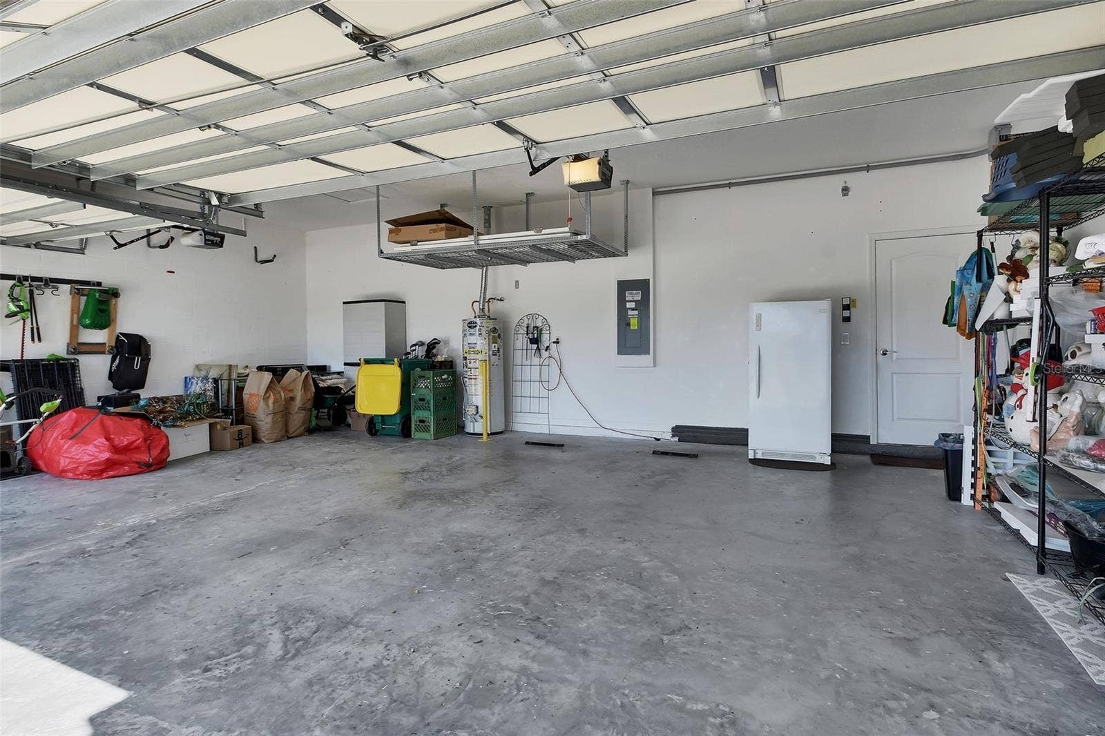 3 Car Garage with hanging storage